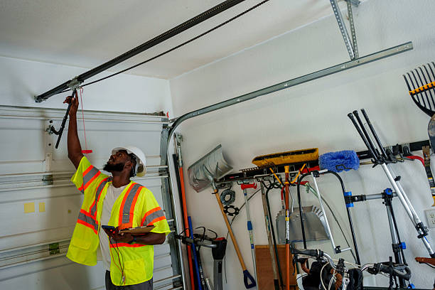 Professional Garage Door Panel Replacement technician working in Fitchburg, MA